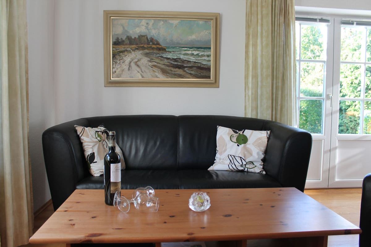 Ihr behagliches Wohnzimmer mit Ausgang zur Terrasse